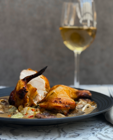 Roast Chicken with Corn, Lardons, Texas Mushrooms, and Chicken Jus